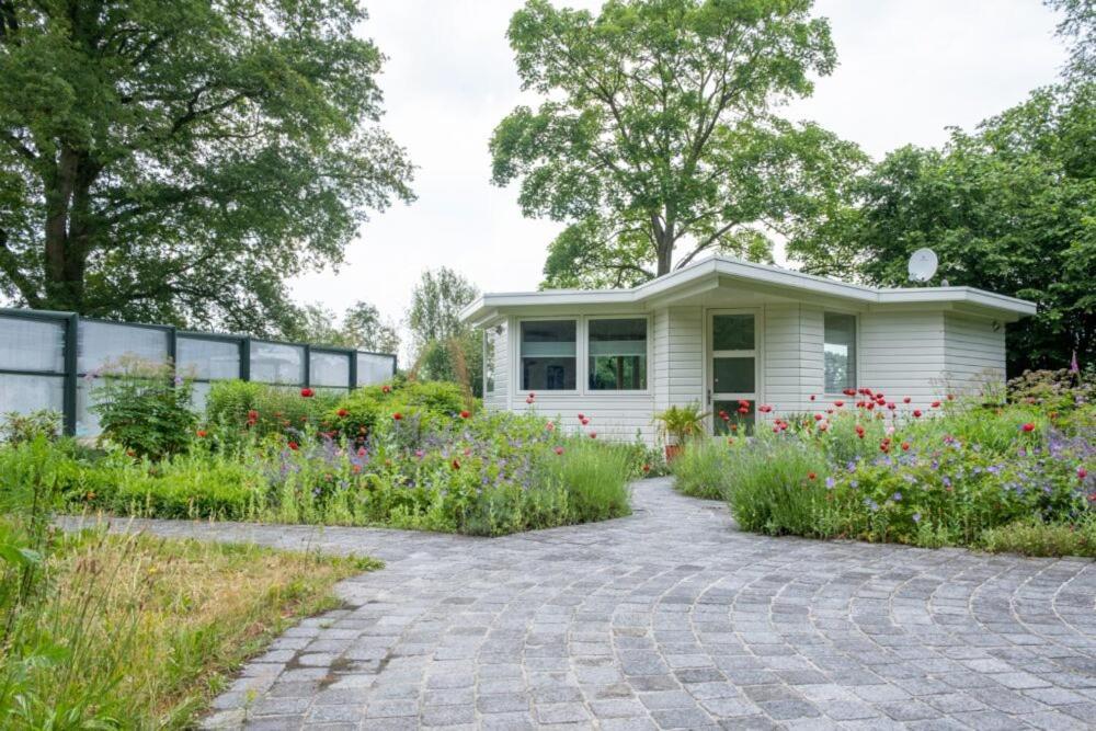 Het Findament Tiny House Villa ฮิลเวอร์ชุม ภายนอก รูปภาพ