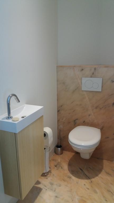 Het Findament Tiny House Villa ฮิลเวอร์ชุม ภายนอก รูปภาพ